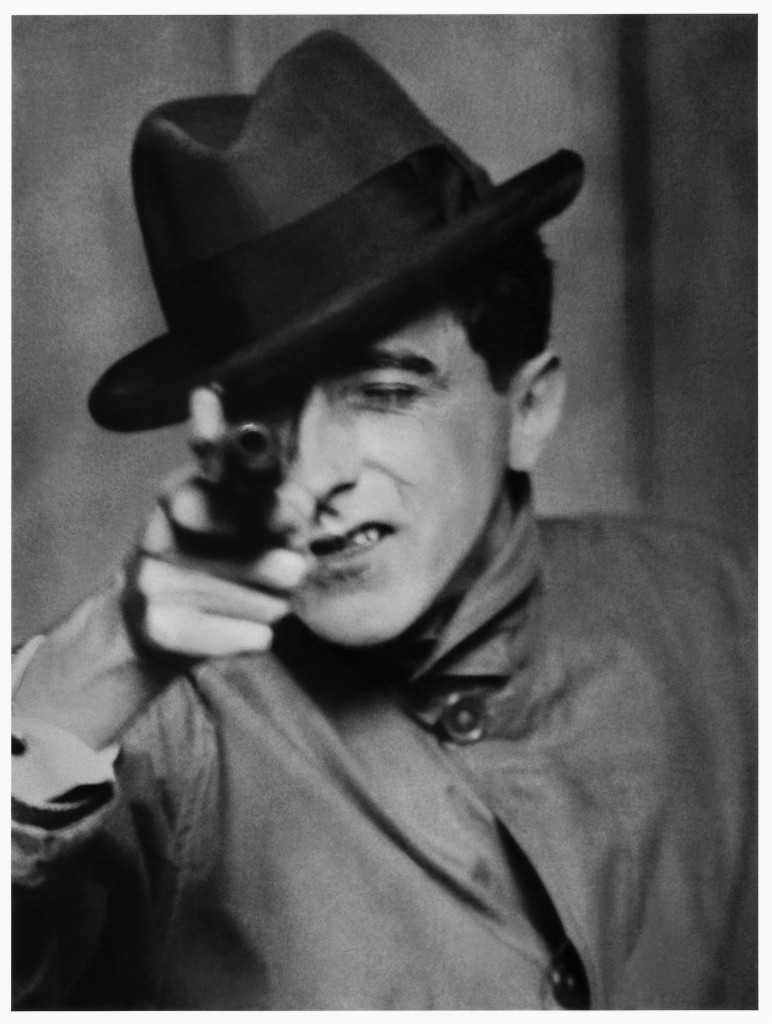 Jean Cocteau with Gun - NYC - 1926 © Berenice Abbott