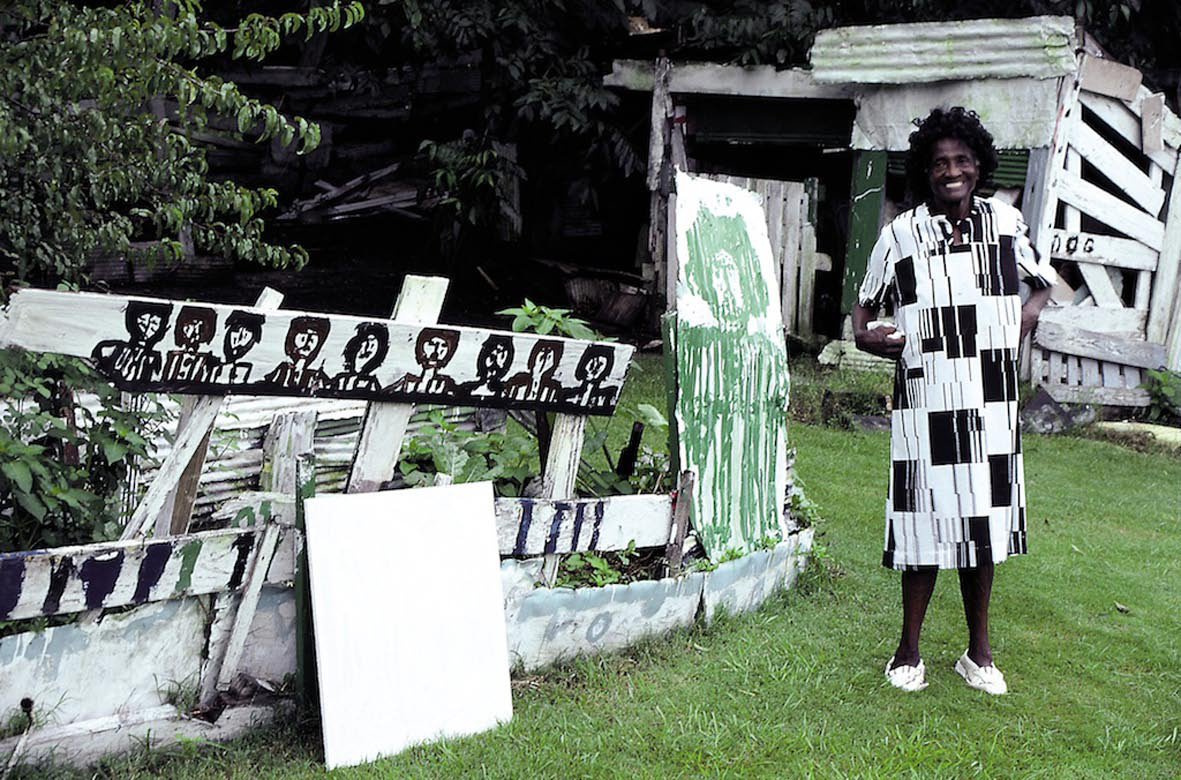Mary T. Smith by her house (Image via Christian Berst gallery)