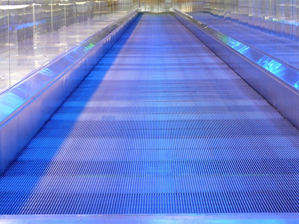 'Metal Segments Moving Walkway Roller Platform'. Image courtesy Public Domain Pictures.