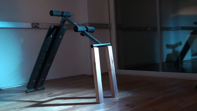 Leah Capaldi, Ab Rider, Power Pro (video still), (2014). From 'Chorus' Installation.
