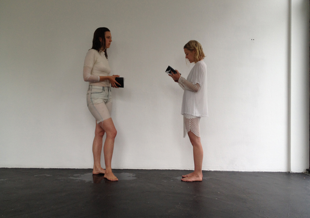 Performance/reading of a gesture waves us on, answering our own wave (2014) by V4ULT with Susan Ploetz and Julia Zange @ Center, Berlin. Courtesy the gallery.