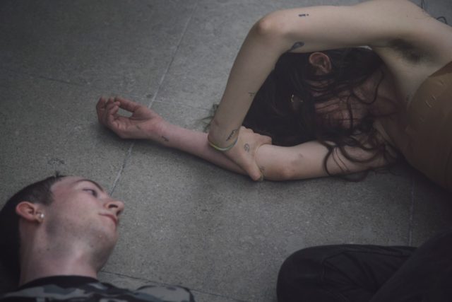 Eliza Douglas and Mickey Mahar in Anne Imhof’s 'Angst II', (2016). Performance documentation. Courtesy the artist + Hamburger Bahnhof Berlin. Photo: Nadine Fraczkowski